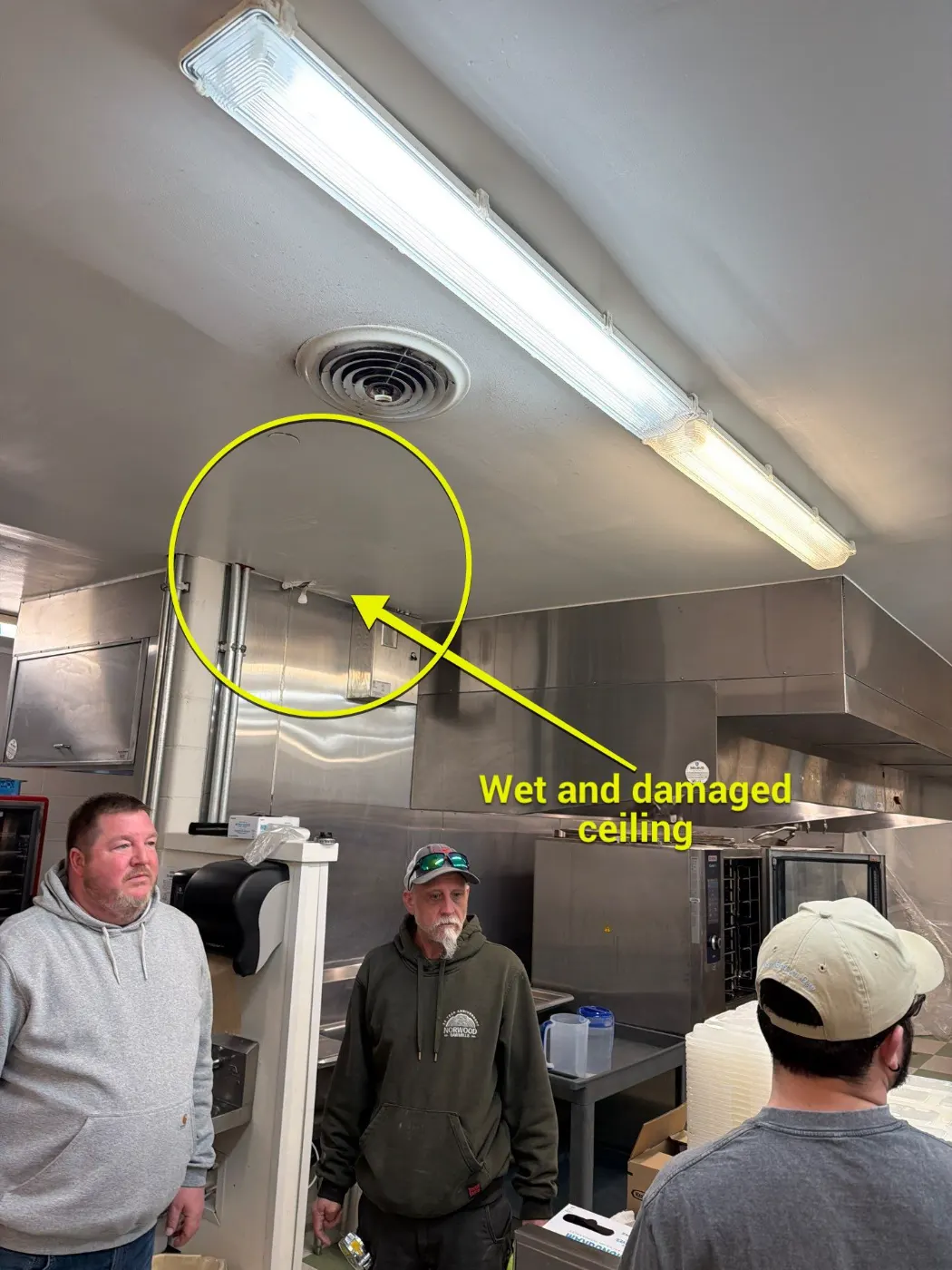 Sewage cleanup crew in PPE on-site in Daleville, IN